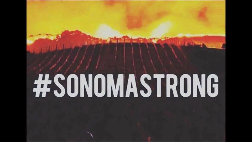Sonoma Strong graphic showing flames above a vineyard